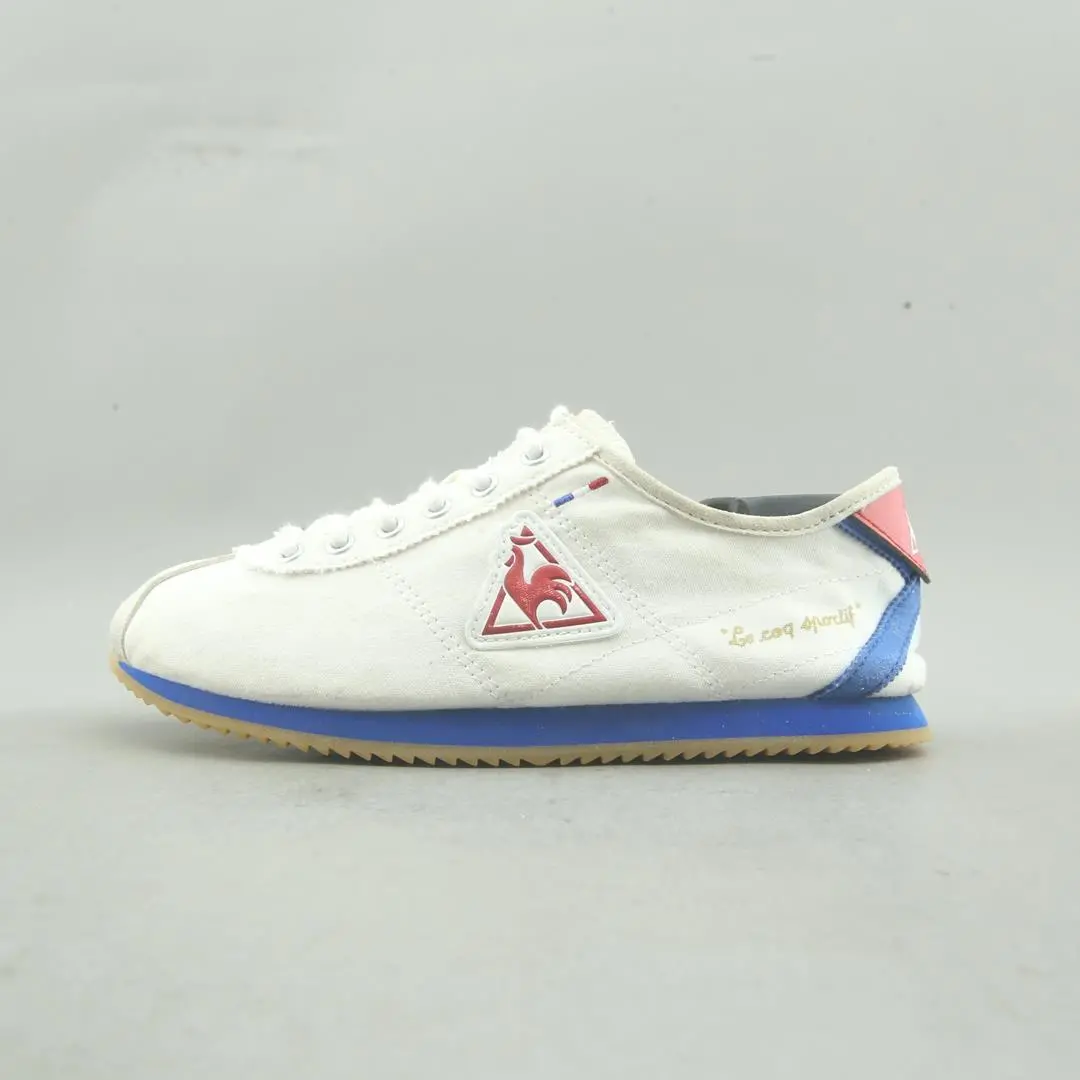 Le Coq Sportif . 1