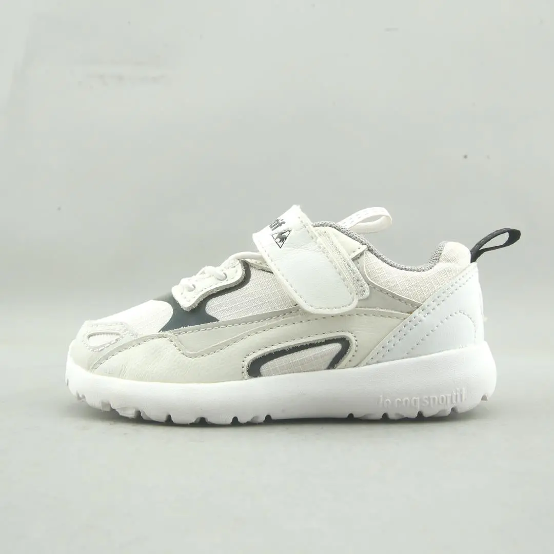 Le Coq Sportif . 1